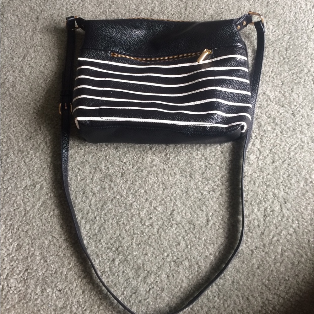 A black and white stripped purse